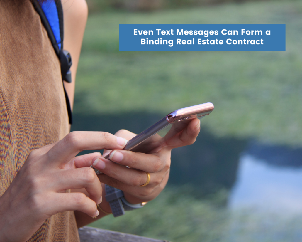 Adult using a smart phone to text about a real estate contract