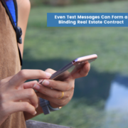 Adult using a smart phone to text about a real estate contract